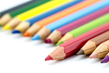 Fototapeta premium Colorful wooden pencils isolated on white background