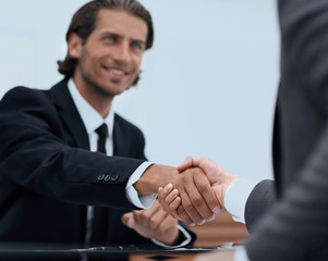 Fototapeta premium handshake Manager and the client sitting in the office