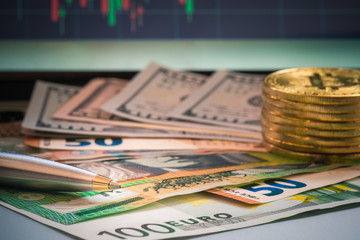 Close-up pen on money and coin vintage tone, Business concept a pen with EUR, coin, Australia and america banknote