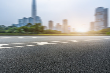 urban traffic road with cityscape in background, China.
