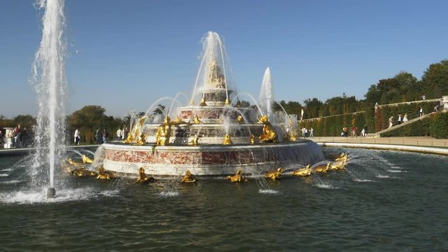 wide angle 120p slow motion clip of latona fountain in the gardens of versailles palace in paris, france