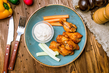Chicken wings with blue cheese sauce