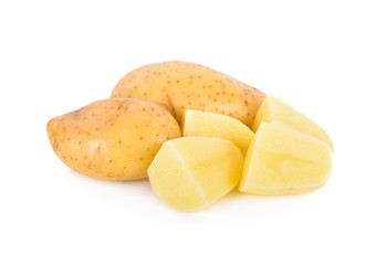whole and peeled fresh potatoes on white background