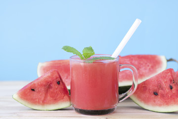 watermelon slice drink juice on wood table