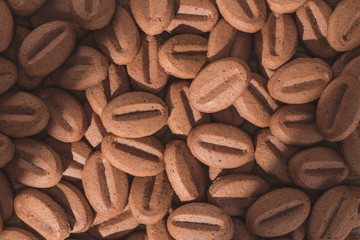 top view of delicious cookies in shape of coffee beans