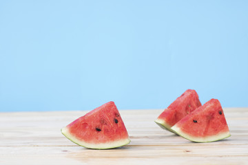 piece of watermelon on wood table