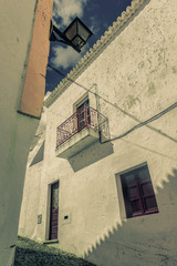 Typical street in the lovely village of Mertola. Alentejo Region. Portugal. Vintage style