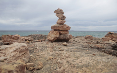Stone balancing in the south coast of the Spanish island of Mallorca.