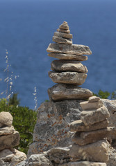 Fototapeta na wymiar Stone balancing in the south coast of the Spanish island of Mallorca.