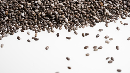 Chia seeds isolated with white background. Healthy superfood.