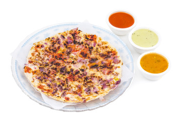 South Indian Food Uttapam Also Know As ooththappam, Rava Uttapam, Uttapa or Uthappa is a Popular South Indian Delicious Spicy Breakfast Snack Served with Coconut Chutney, Tomato Sauce and Sambar