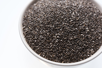Chia seeds isolated with white background. Healthy superfood.