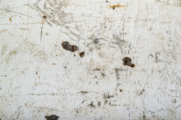 Old dirty metal coated with white paint