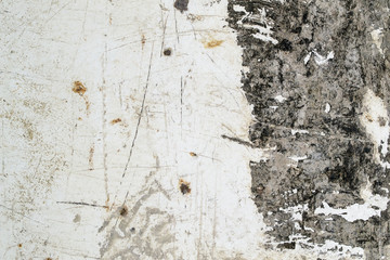 Old dirty metal coated with white paint