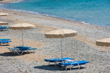 Sunbeds and umbrellas on the beach
