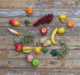autumn harvest of vegetables on a wooden background, rustic scenery