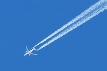 airplane against the blue sky