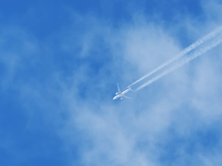 airplane against the blue sky