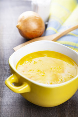 Cheese soup in a yellow plate
