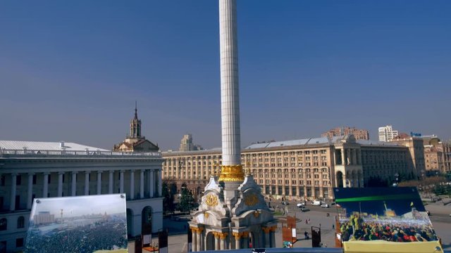 Slow tilt up of Independence Monument at Maidan Nezalezhnosti in Kiev, Ukraine