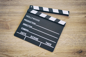 Clapper board,Movie clapper on wooden backgrond