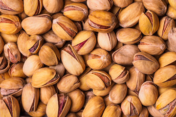 Pistachio texture. Nuts. Roasted salted pistachio nuts healthy delicious food studio photo.