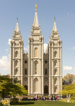 Weddings being celebrated outside Salt Lake Temple in springtime. The Church of Jesus Christ of Latter-day Saints, Temple Square, Salt Lake City, Utah, USA.