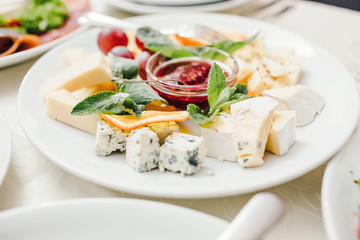 catering table set service with silverware and glass stemware at