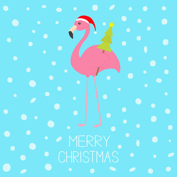 Merry Christmas. Pink flamingo with wing holding fir tree. Santa Claus hat. Exotic tropical bird. Zoo animal collection. Cute cartoon character. Decoration element. Flat design. Blue snow background.