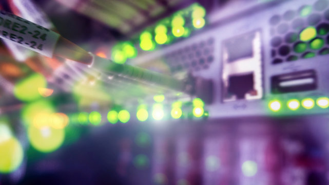 Rack Mounted Servers In A Server Room, Server rack audio cable. Severs computer in a rack at the large data center. Fiber Optical connector interface for Cards Equipment DWDM telecommunications