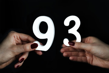 To female hands the figure of ninety-three.