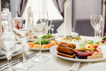 Served dishes to the table for holiday.