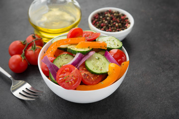 Fresh vegetables salad, tomato, pepper, cucumber