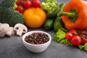 Raw fresh vegetables with spices bowl