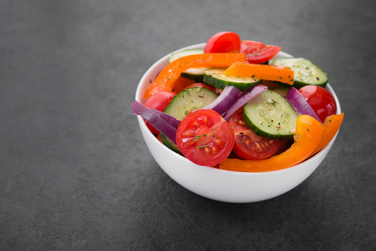 Fresh vegetables salad, tomato, pepper, cucumber