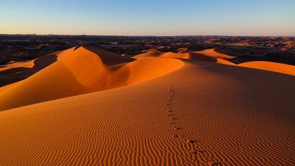 Sunset view to Tin Merzouga dune at Tassili nAjjer national park in Algeria