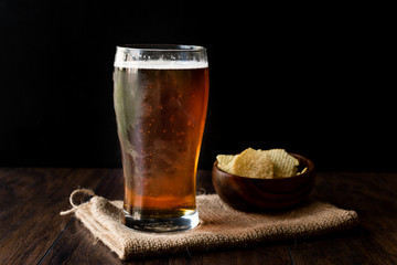 Cool Refreshing Amber Beer with Snacks.