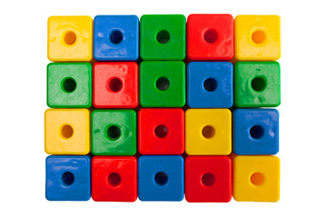 Colored plastic cubes on a white background