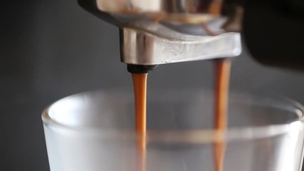 Coffee machine pouring espresso coffee 