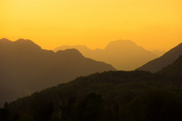 Rocky mountains silhouette on a sunset.