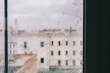 Fototapeta na wymiar City From Broken Window