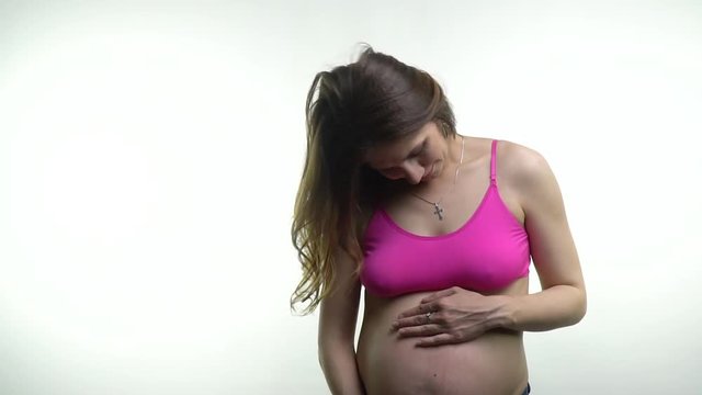 Pregnant woman doing neck workout