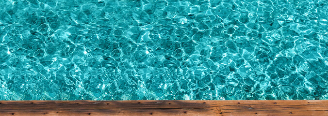 Wooden pier with crystal water