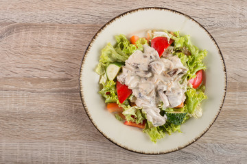 Fresh salad with mushrooms and vegetables