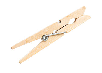 Wooden clothespin isolated on white background - close-up