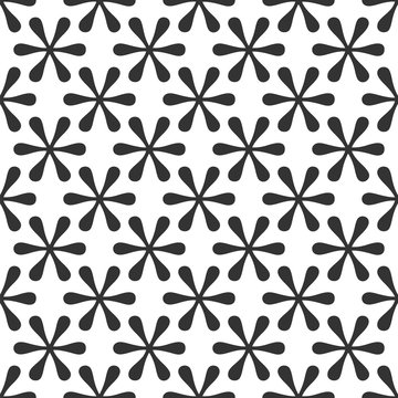     Rounded stars. Llike a flowers with six petals. Abstract monochrome geometric background. Monotonous seamless pattern. Diagonal layout.