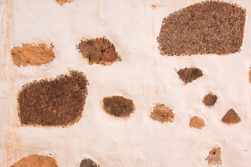 Hintergrund – alte spanische verputzte  Natursteinmauer