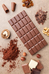 Delicious chocolate bar and ingredients