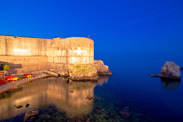 Dubrovnik walls and waterfront evening view