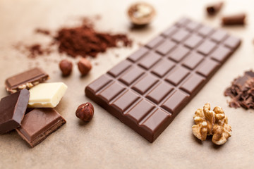 Delicious chocolate bar and ingredients
